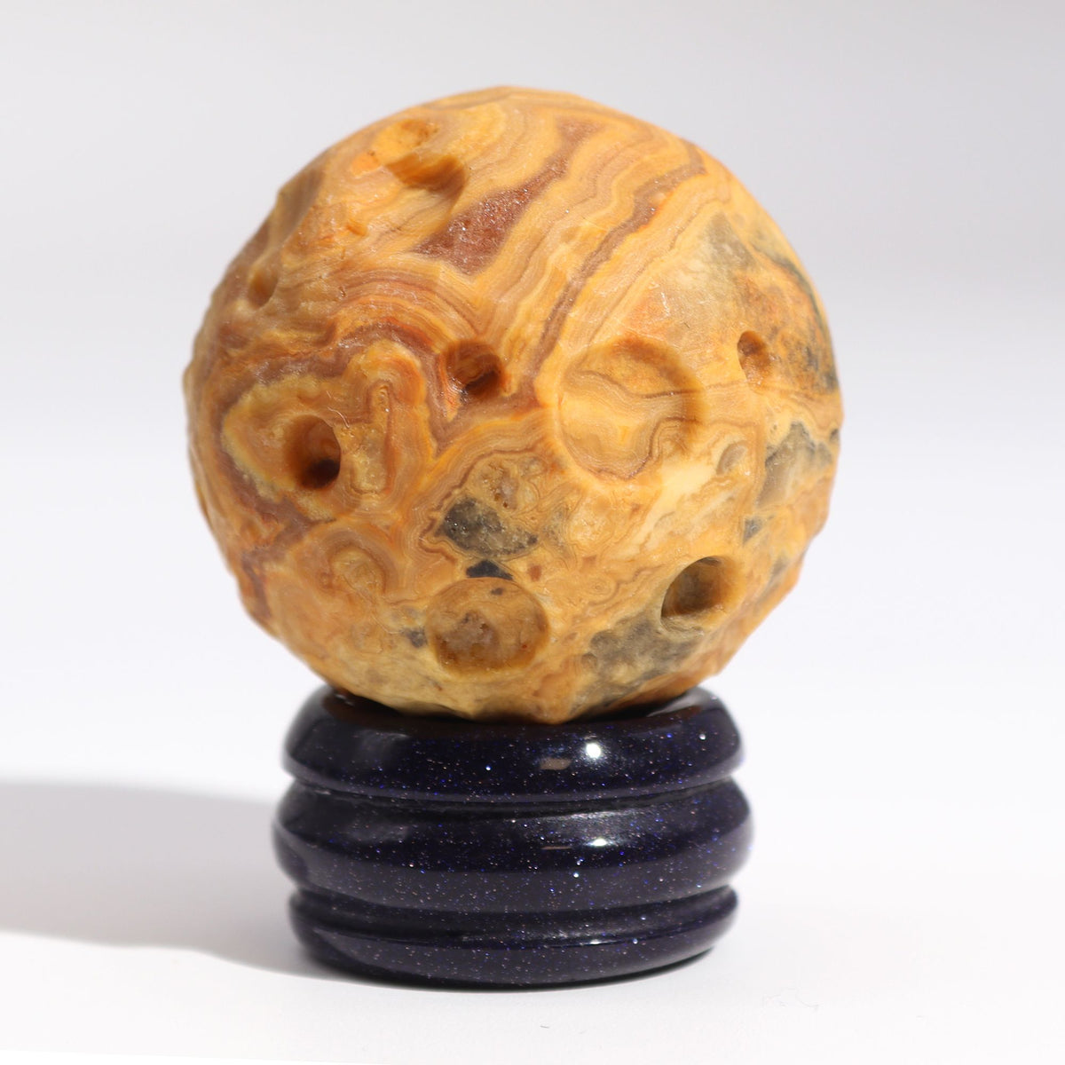 Planet aus Crazy Lace Jasper auf einem Sola Goldstone-Ständer - Merkur
